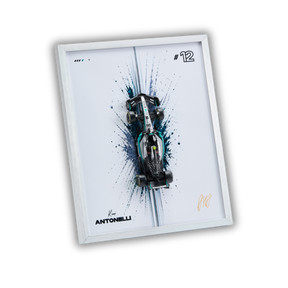 A framed art print featuring a Mercedes-AMG F1 race car with a blue paint splatter design, signed by Kevin Antonelli, displayed on a clean white background.