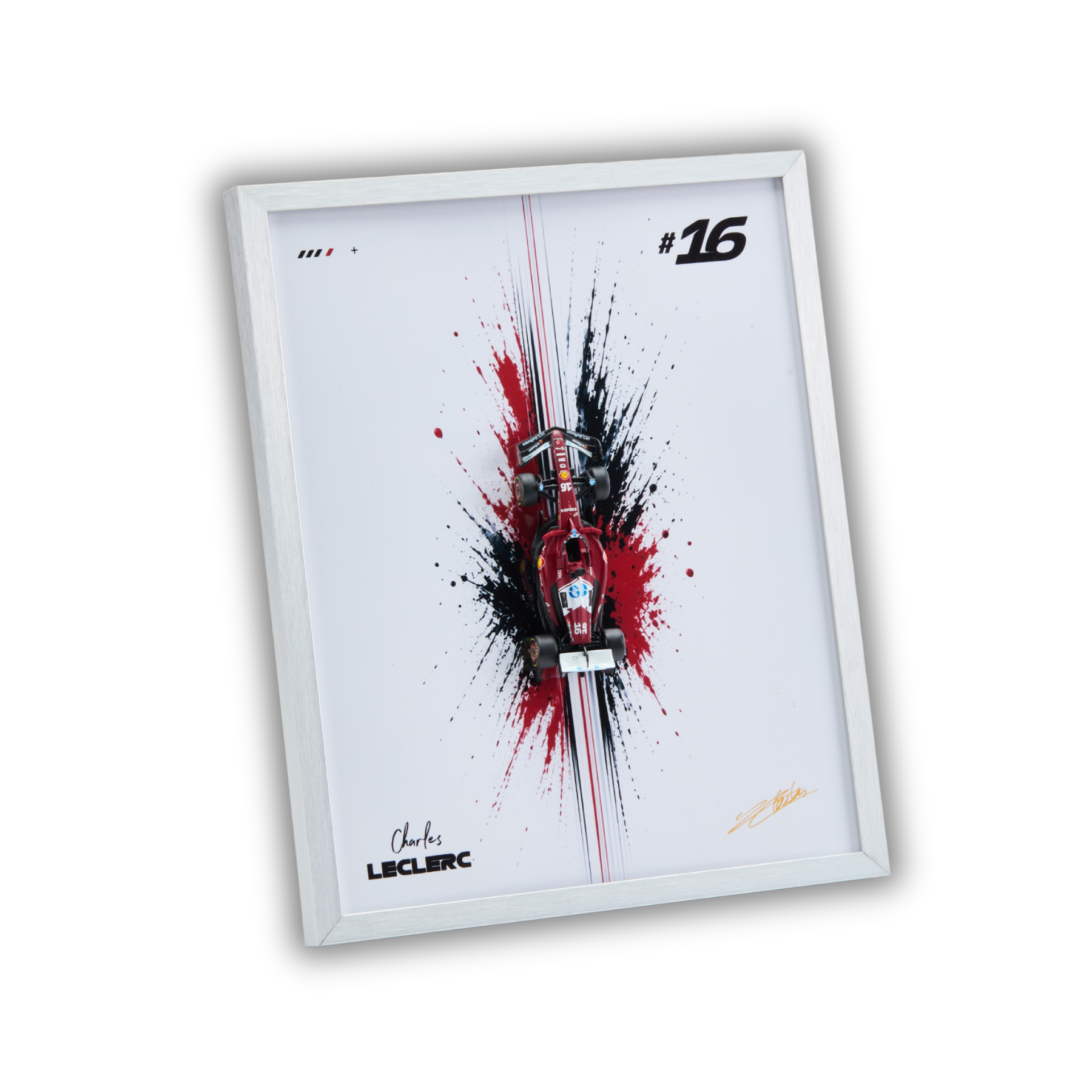 A framed art print featuring a stylized red and white Formula 1 car centered over a bold black and red paint splatter design on a white background. The print includes the number 16, the name Jack Leclerc, and a signature, all enclosed in a slim white frame.