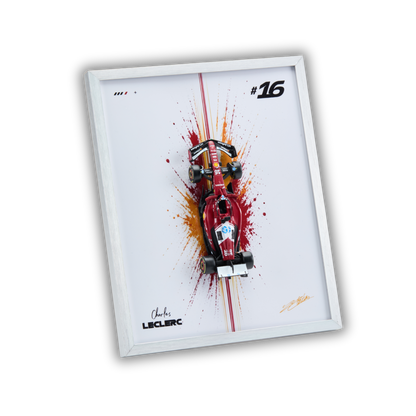 A framed wall art print featuring a red Formula 1 car with paint splatter effects on a white background, surrounded by a white frame. The print includes the number 16 and the name Jolyon Lepage.