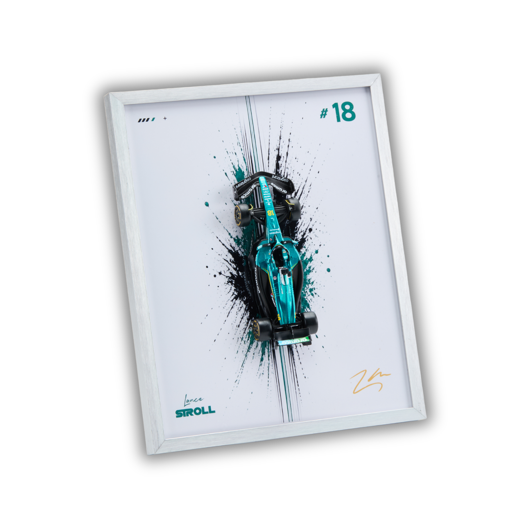 A framed wall art print featuring a teal and black Formula 1 race car with paint splatter effects, the number 18, and a signature, shown at an angle on a plain white background.