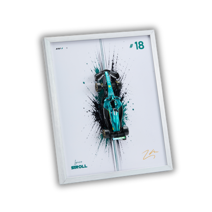 A framed wall art print featuring a teal and black Formula 1 race car with paint splatter effects, the number 18, and a signature, shown at an angle on a plain white background.