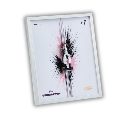 A framed art print featuring a miniature white and red Formula 1 race car on a white background with black and pink paint splatters, displayed in a white frame at an angle.