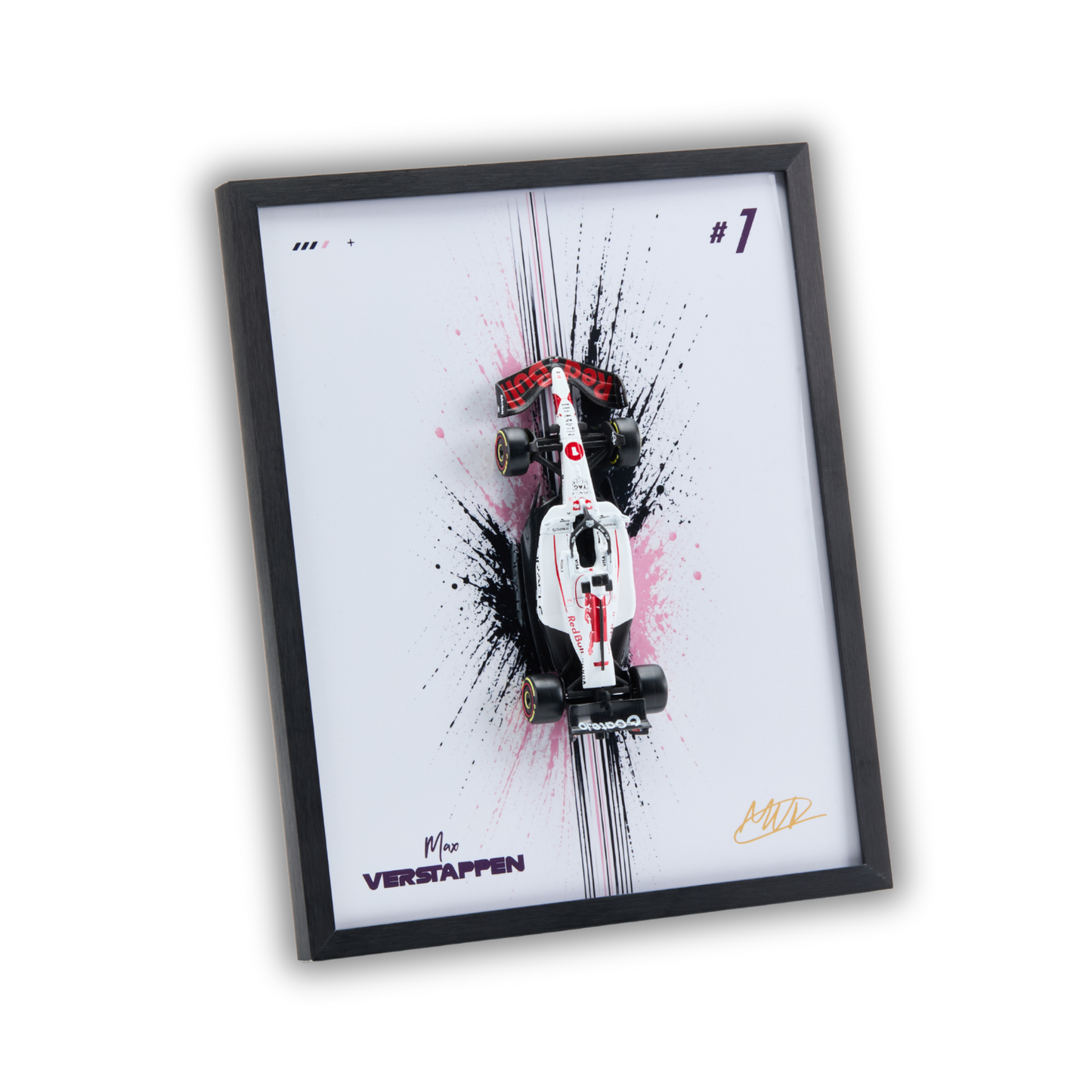 A framed art print featuring a white and red Formula 1 race car with black wheels, set against a white background with pink paint splatters. The print includes the text 'Max VERSTAPPEN' and a gold signature, enclosed in a black frame.