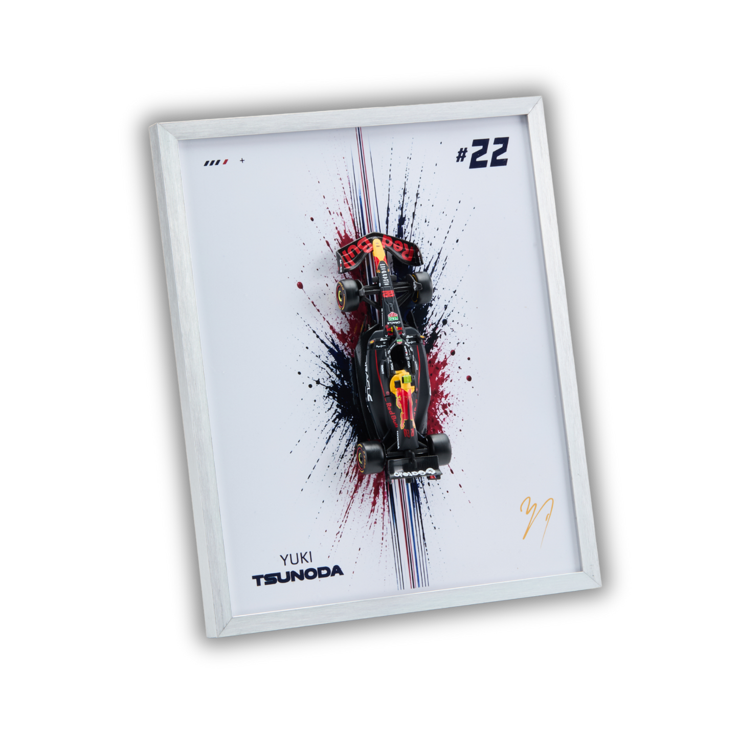 A framed custom automotive art print featuring a stylized Red Bull Racing car with a black, red, and yellow paint splatter design on a white background, housed in a white frame.